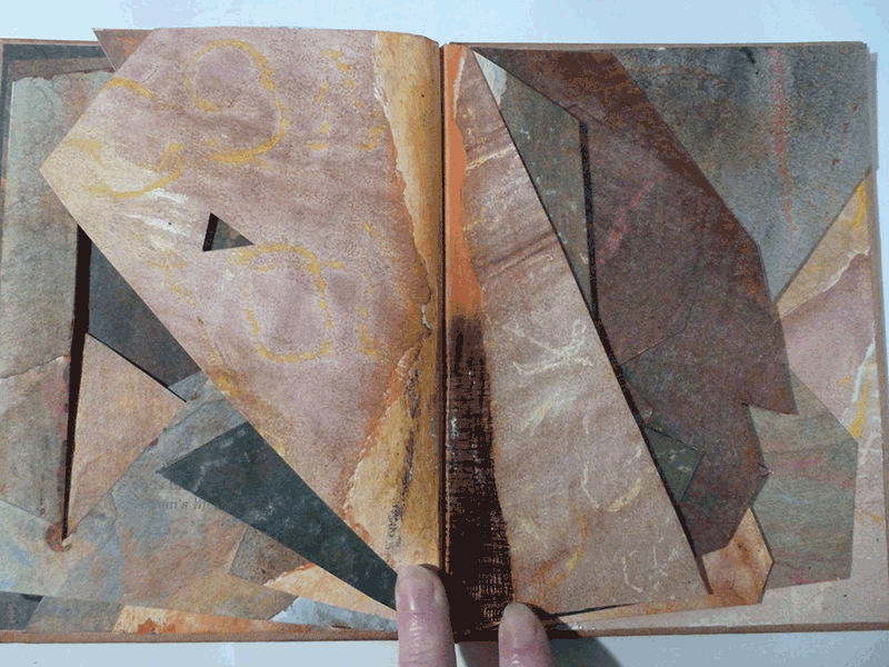 altered book with rubbings