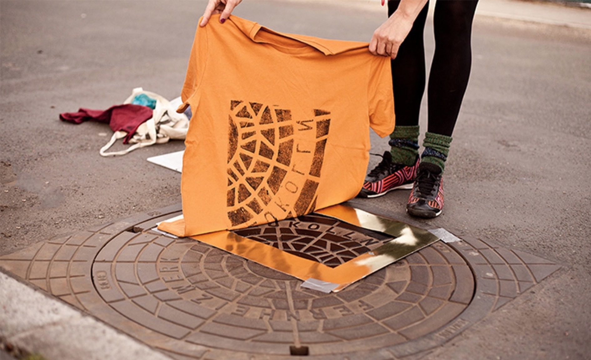 T-shirts printed on manholes